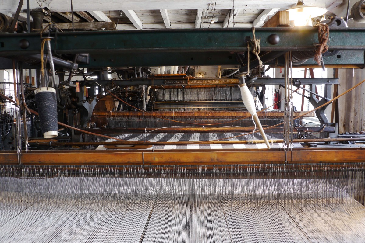 View over the looms in the weaving mill