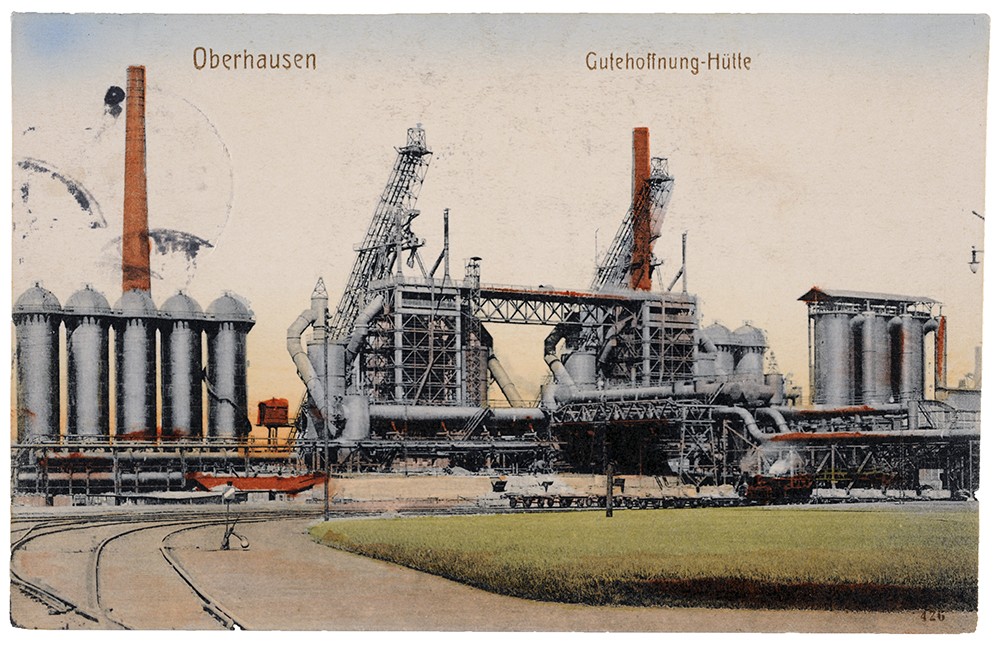 Vorderseite einer Postkarte zeigt ein Stahlwerk