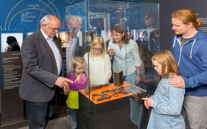 A family learning together at our museum