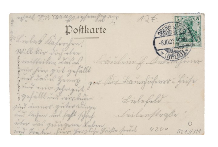 Rückseite einer Postkarte mit handgeschriebenem Text