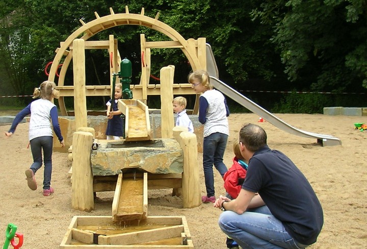 Children playing on the grounds of the themed playground