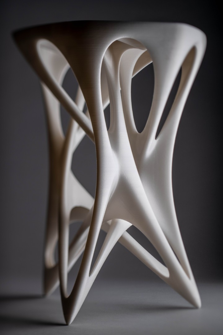 Abstract bone like looking chair made out of plastic.