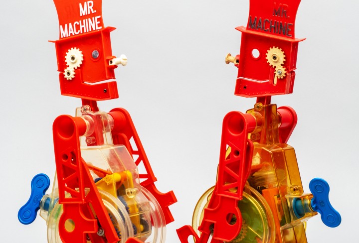 Two colorful plastic robots