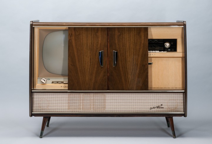 Wooden cabinet with built-in record player and television
